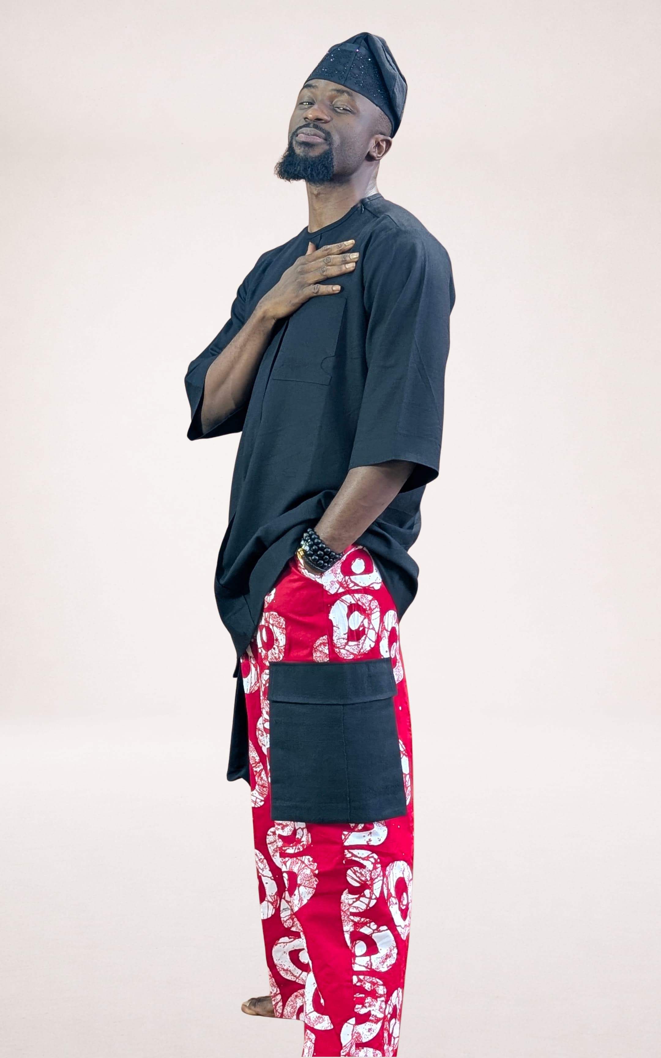 Red Adire Trousers, Black Native Shirt and Black Cap - page 2